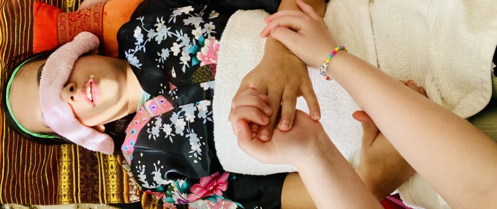 Girl having hand massage